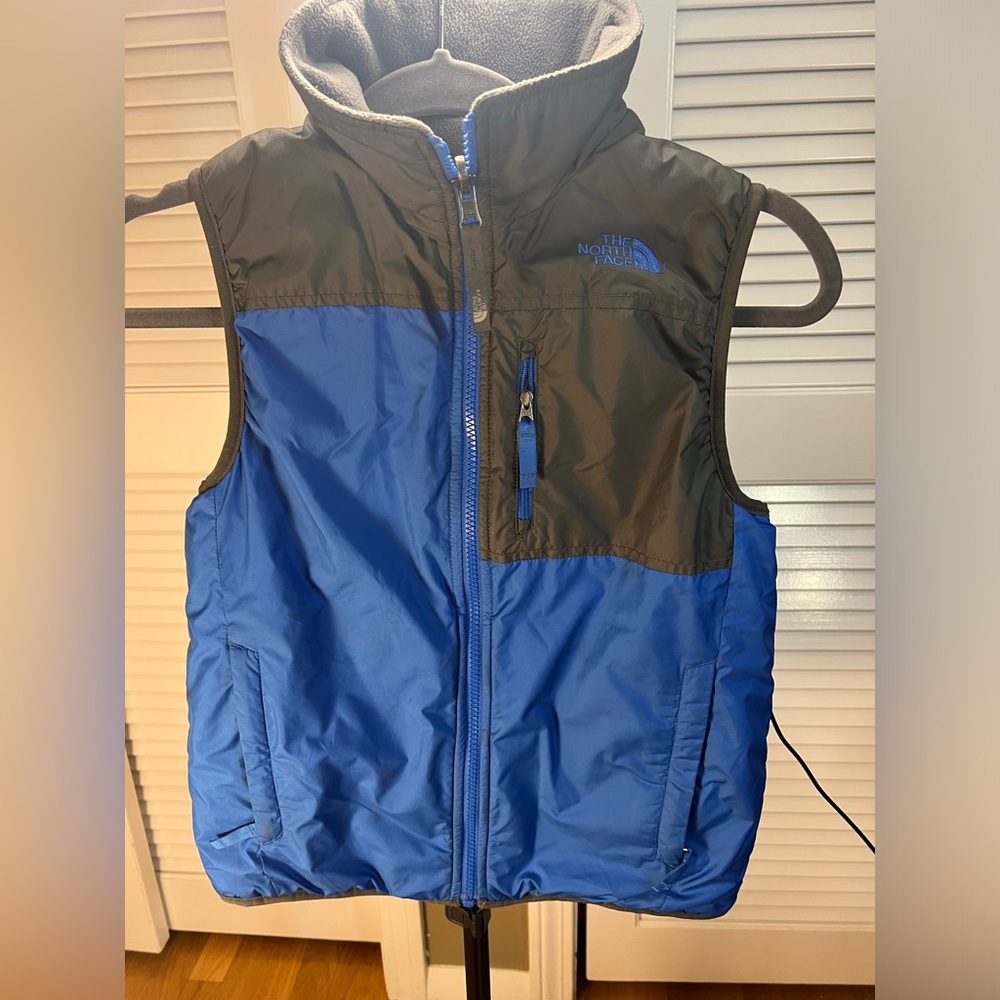 The North Face boys reversable vest; size large